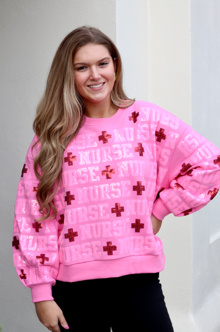 Pink 'Nurse" All Over Sweatshirt