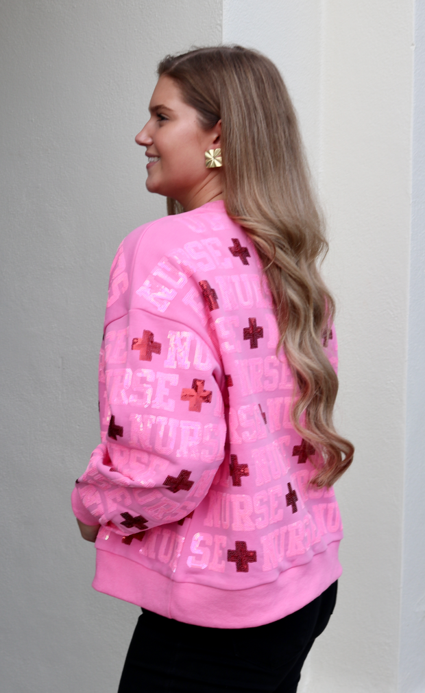 Pink 'Nurse" All Over Sweatshirt